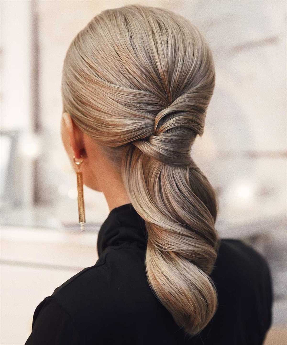 Coda bassa capelli medi invitata matrimonio Coda bassa capelli medi invitata matrimonio