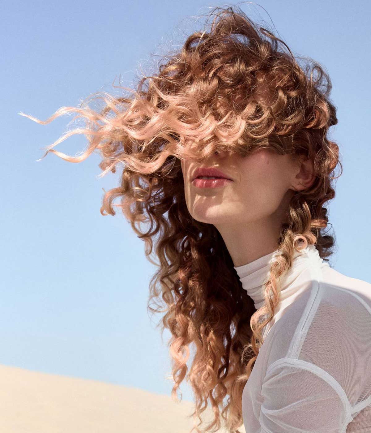 Capelli lunghi ricci tagli scalati Capelli lunghi ricci tagli scalati