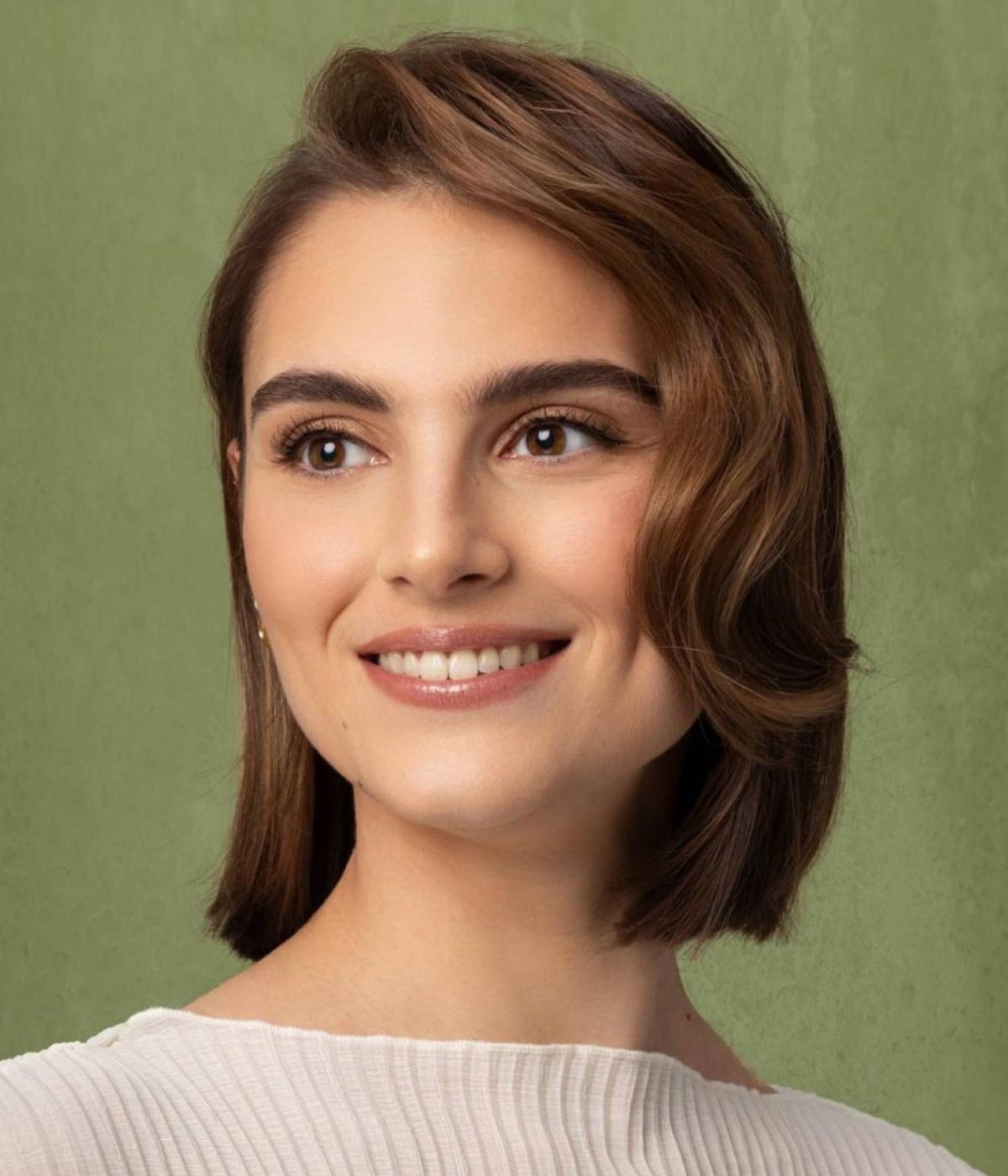 Caschetto liscio con ciuffo Caschetto liscio con ciuffo